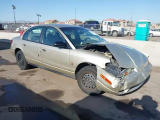 2002 Saturn SL with VIN 1G8ZH52882Z305318, listed as a IAAI auction lot 42461555 with 110,007 mi miles and . Bid and sale history available at DreamBid. Image 1.