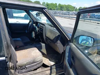 1999 Jeep Cherokee Sport with VIN 1J4FF68S6XL630724, listed as a IAAI auction lot 42237548 with 267,382 mi miles and . Bid and sale history available at DreamBid. Image 5.