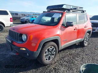 2017 Jeep Renegade Trailhawk z VIN ZACCJBCB7HPF25940, wystawiony jako IAAI lot #41372188 z przebiegiem 146 817 mil mil oraz . Historia ofert i sprzedaży dostępna na DreamBid. Obrazek 2.
