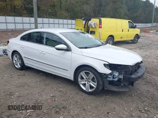 2016 Volkswagen CC Sport with VIN WVWBN7AN4GE512547, listed as a IAAI auction lot 40802001 with 94,513 mi miles. Bid and sale history available at carsss.com. Image 1.