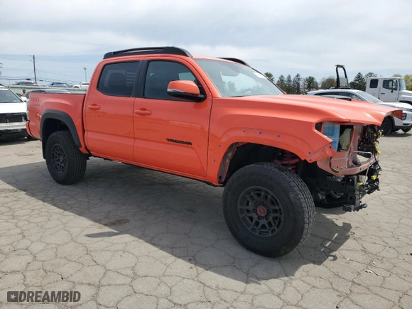 2023 Toyota Tacoma 4WD SR with VIN 3TYCZ5AN8PT162433, listed as a Copart auction lot 52911055 with 7,321 mi miles and Salvage Title. Bid and sale history available at carsss.com. Image 4.