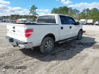 2012 Ford F-150 XL with VIN 1FTEW1CMXCFB05767, listed as a IAAI auction lot 41726889 with 302,191 mi miles. Bid and sale history available at carsss.com. Image 4.