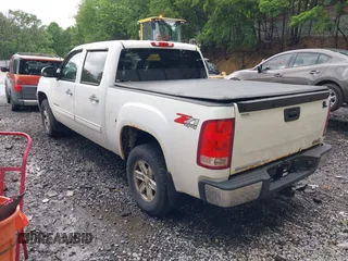 2012 GMC Sierra 1500 SLE z VIN 3GTP2VE71CG229654, wystawiony jako IAAI lot #42461209 z przebiegiem 180 378 mil mil oraz . Historia ofert i sprzedaży dostępna na DreamBid. Obrazek 3.