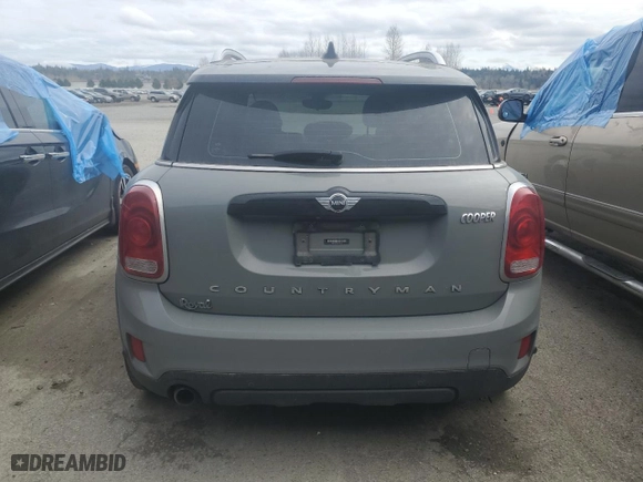 2017 MINI Countryman Cooper with VIN WMZYS7C38H3E06844, listed as a Copart auction lot 46887525 with 102,633 mi miles and Salvage Title. Bid and sale history available at carsss.com. Image 6.