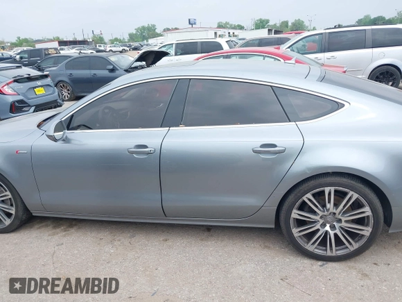 2013 Audi A7 Premium Plus with VIN WAUYGAFC1DN069906, listed as a IAAI auction lot 41906962 with 203,149 mi miles and . Bid and sale history available at DreamBid. Image 14.