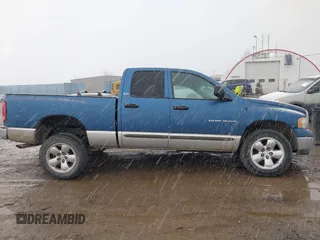 2002 Dodge 1500 with VIN 1D7HU18Z22J107201, listed as a IAAI auction lot 41826723 with 138,491 mi miles. Bid and sale history available at carsss.com. Image 14.