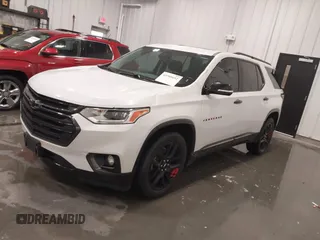 2018 Chevrolet Traverse Premier z VIN 1GNEVJKW4JJ163087, wystawiony jako IAAI lot #41509692 z przebiegiem 118 158 mil mil oraz . Historia ofert i sprzedaży dostępna na DreamBid. Obrazek 18.