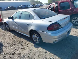 2004 Pontiac Grand Am SE with VIN 1G2NE52F74M684408, listed as a IAAI auction lot 39194361 with 169,247 mi miles. Bid and sale history available at carsss.com. Image 3.