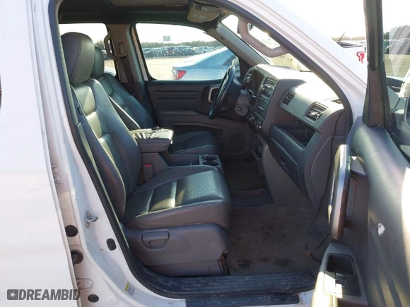 2013 Honda Ridgeline RTL with VIN 5FPYK1F58DB015799, listed as a IAAI auction lot 41498052 with 104,372 mi miles. Bid and sale history available at carsss.com. Image 5.