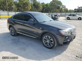 2017 BMW X4 xDrive28i with VIN 5UXXW3C36H0T79956, listed as a Copart auction lot 50156445 with 100,226 mi miles and Salvage Title. Bid and sale history available at carsss.com. Image 4.