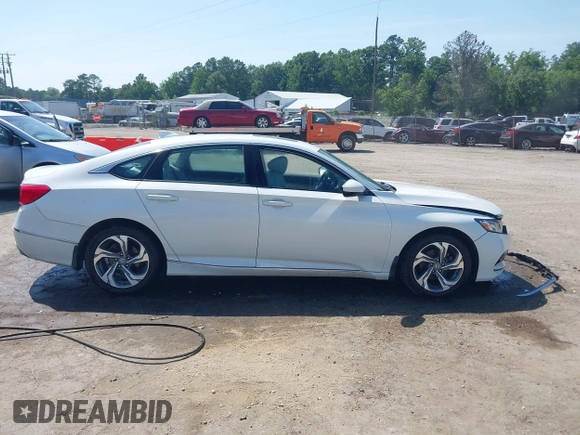 2020 Honda Accord EX with VIN 1HGCV1F40LA031912, listed as a IAAI auction lot 42580982 with 103,757 mi miles and . Bid and sale history available at DreamBid. Image 14.