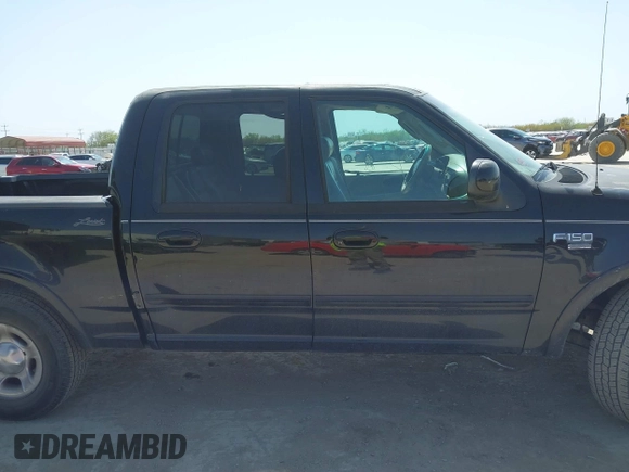 2003 Ford F-150 XLT with VIN 1FTRW07L53KC01651, listed as a IAAI auction lot 41827007 with 233,842 mi miles and . Bid and sale history available at DreamBid. Image 13.