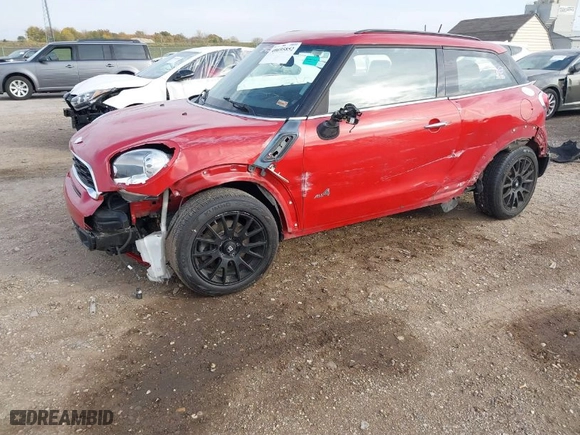 2014 MINI Cooper Paceman S with VIN WMWSS7C55EWS44439, listed as a IAAI auction lot 40695852 with 102346 miles. Bid and sale history available at carsss.com. Image 6.