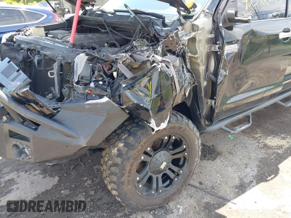 2014 Toyota Tundra Platinum with VIN 5TFAW5F15EX354983, listed as a IAAI auction lot 42392023 with 225,580 mi miles and . Bid and sale history available at DreamBid. Image 6.