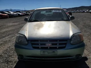 2003 Hyundai Accent GL with VIN KMHCG35C83U257641, listed as a Copart auction lot 73421464 with 143,814 mi miles and Clean Title. Bid and sale history available at carsss.com. Image 5.