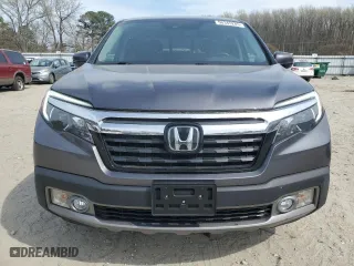 2020 Honda Ridgeline RTL-E with VIN 5FPYK3F73LB004981, listed as a Copart auction lot 50345285 with 76,547 mi miles and Salvage Title. Bid and sale history available at carsss.com. Image 5.