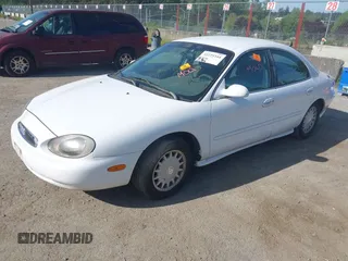 1997 Mercury Sable GS z VIN 1MELM50U4VG644616, wystawiony jako IAAI lot #42229344 z przebiegiem 121 780 mil mil oraz . Historia ofert i sprzedaży dostępna na DreamBid. Obrazek 2.