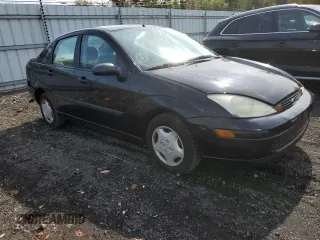 2002 Ford Focus LX with VIN 1FAFP33P72W239485, listed as a Copart auction lot 73323084 with 94,876 mi miles and Non Repairable. Bid and sale history available at DreamBid. Image 4.