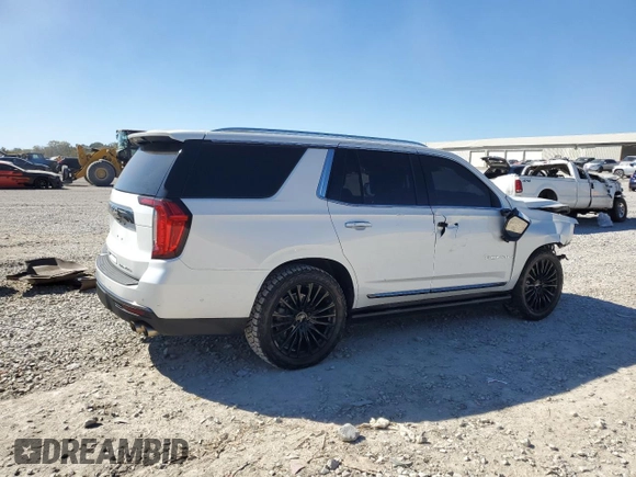 2023 GMC Yukon Denali Ultimate with VIN 1GKS2EKL0PR132029, listed as a Copart auction lot 77234034 with 58,071 mi miles and Salvage Title. Bid and sale history available at carsss.com. Image 3.