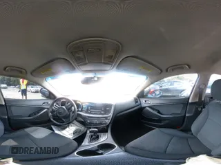 2015 Kia Optima LX with VIN 5XXGM4A70FG486256, listed as a IAAI auction lot 42211318 with 141,515 mi miles and . Bid and sale history available at DreamBid. Image 12.