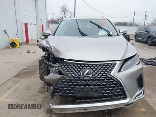 2021 Lexus RX with VIN 2T2HZMDA4MC305057, listed as a IAAI auction lot 41706486 with 37,518 mi miles. Bid and sale history available at carsss.com. Image 13.