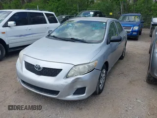2009 Toyota Corolla with VIN JTDBL40E099041319, listed as a IAAI auction lot 42119698 with 205,666 mi miles. Bid and sale history available at carsss.com. Image 2.