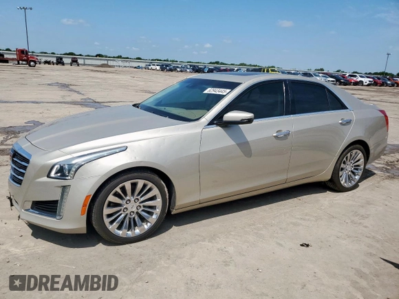 2014 Cadillac CTS Luxury AWD with VIN 1G6AX5SX2E0141251, listed as a Copart auction lot 62943445 with 85,614 mi miles and Salvage title. Bid and sale history available at DreamBid. Image 1.