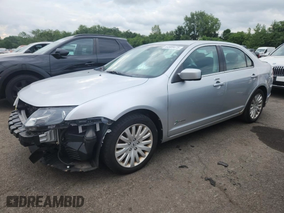 2012 Ford Fusion Hybrid z VIN 3FADP0L34CR227740, wystawiony jako Copart lot #64989475 z przebiegiem 134 862 mil mil oraz Szkoda całkowita • Salvage title. Historia ofert i sprzedaży dostępna na DreamBid. Obrazek 1.