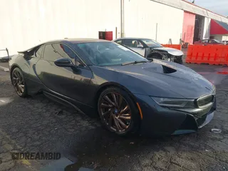 2016 BMW i8 with VIN WBY2Z2C50GV674856, listed as a IAAI auction lot 40862121 with 51,700 mi miles. Bid and sale history available at carsss.com. Image 1.