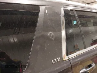 2016 Chevrolet Tahoe LTZ with VIN 1GNSKCKC1GR201155, listed as a IAAI auction lot 42235228 with 184,585 mi miles and . Bid and sale history available at DreamBid. Image 17.