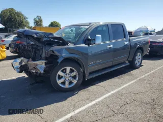 2011 Nissan Titan SV z VIN 1N6AA0ED0BN305711, wystawiony jako Copart lot #63915575 z przebiegiem Nie podano mil oraz Szkoda całkowita • Salvage title. Historia ofert i sprzedaży dostępna na DreamBid. Obrazek 1.
