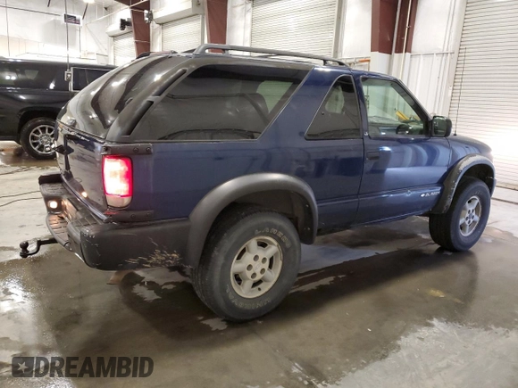 1999 Chevrolet Blazer LS с VIN 1GNCT18W9XK157387, выставлен на аукционе Copart как лот 49667765 с пробегом 182 411 миль миль и Списание • Salvage title. История ставок и продаж доступна на DreamBid. Изображение 3.