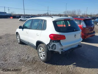 2015 Volkswagen Tiguan S with VIN WVGBV7AX5FW610055, listed as a IAAI auction lot 41502961 with 81,683 mi miles. Bid and sale history available at carsss.com. Image 3.