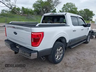 2021 Ford F-150 XL z VIN 1FTFW1ED7MFB36946, wystawiony jako IAAI lot #42318029 z przebiegiem 16 960 mil mil oraz . Historia ofert i sprzedaży dostępna na DreamBid. Obrazek 4.
