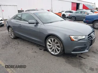 2014 Audi A5 Premium Plus with VIN WAULFAFR3EA038781, listed as a IAAI auction lot 41604968 with 99,261 mi miles and . Bid and sale history available at DreamBid. Image 1.