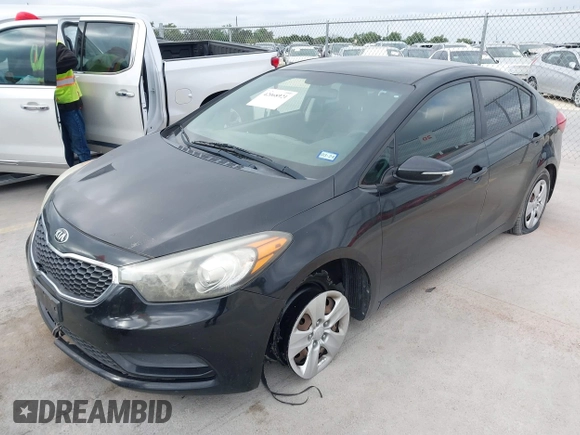 2016 Kia Forte LX with VIN KNAFX4A64G5499881, listed as a IAAI auction lot 42068921 with 122,596 mi miles. Bid and sale history available at carsss.com. Image 2.