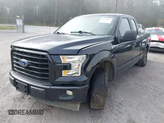 2015 Ford F-150 XL with VIN 1FTEX1CF2FKD12874, listed as a IAAI auction lot 41860610 with 242,215 mi miles. Bid and sale history available at carsss.com. Image 18.