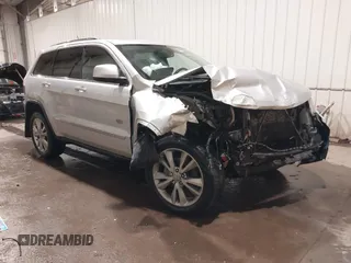 2011 Jeep Grand Cherokee Laredo z VIN 1J4RR4GG3BC666451, wystawiony jako IAAI lot #41492640 z przebiegiem 215 168 mil mil oraz . Historia ofert i sprzedaży dostępna na DreamBid. Obrazek 1.