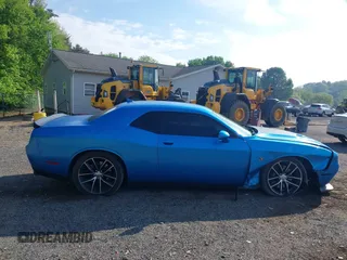 2016 Dodge Challenger R/T Scat Pack z VIN 2C3CDZFJ9GH100372, wystawiony jako IAAI lot #42221915 z przebiegiem 66 896 mil mil oraz . Historia ofert i sprzedaży dostępna na DreamBid. Obrazek 14.