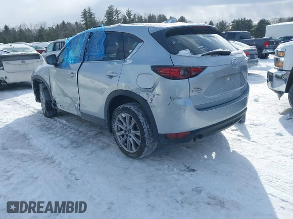 2021 Mazda CX-5 Grand Touring Reserve with VIN JM3KFBAY0M0377030, listed as a IAAI auction lot 41606709 with 39,590 mi miles. Bid and sale history available at carsss.com. Image 3.