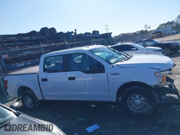 2019 Ford F-150 XL with VIN 1FTEW1C51KKC22877, listed as a IAAI auction lot 41774791 with 143,939 mi miles and . Bid and sale history available at DreamBid. Image 14.