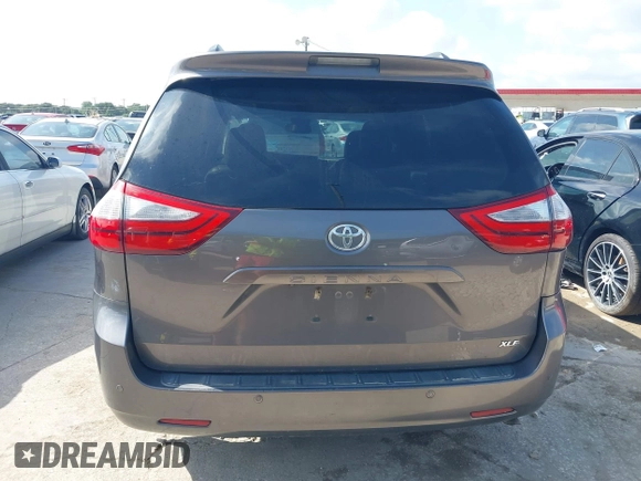 2015 Toyota Sienna XLE with VIN 5TDYK3DC6FS542504, listed as a IAAI auction lot 42569992 with 113,004 mi miles and . Bid and sale history available at DreamBid. Image 16.