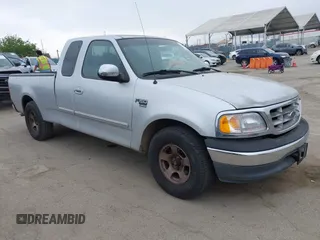 2000 Ford F-150 XL with VIN 1FTRX17W0YKA70861, listed as a IAAI auction lot 42096438 with 1 mi miles. Bid and sale history available at carsss.com. Image 1.