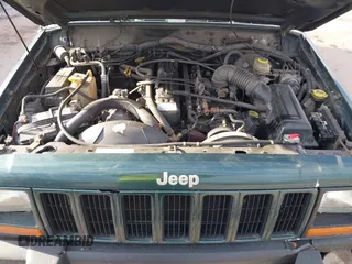 2000 Jeep Cherokee Classic with VIN 1J4FF58S6YL105920, listed as a IAAI auction lot 41497047 with 192,410 mi miles. Bid and sale history available at carsss.com. Image 10.