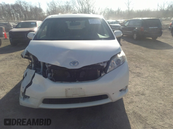 2014 Toyota Sienna XLE with VIN 5TDYK3DC3ES491381, listed as a IAAI auction lot 41803362 with 253,940 mi miles. Bid and sale history available at carsss.com. Image 12.
