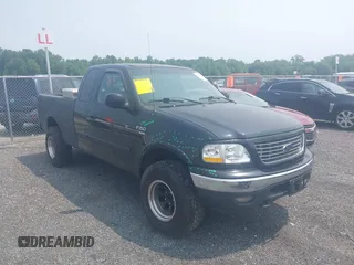 2001 Ford F-150 XL with VIN 1FTRX18L21NA16339, listed as a IAAI auction lot 42401715 with 20,000 mi miles and . Bid and sale history available at DreamBid. Image 1.