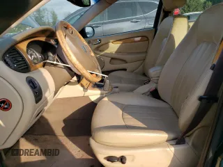 2004 Jaguar X-Type z VIN SAJEA51C04WD65097, wystawiony jako Copart lot #53825295 z przebiegiem 58 270 mil mil oraz Szkoda całkowita • Salvage title. Historia ofert i sprzedaży dostępna na DreamBid. Obrazek 7.