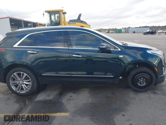 2024 Cadillac XT5 FWD Premium Luxury with VIN 1GYKNCR45RZ733939, listed as a IAAI auction lot 41224515 with 6,945 mi miles. Bid and sale history available at carsss.com. Image 14.
