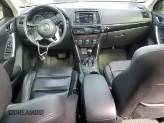2015 Mazda CX-5 Grand Touring with VIN JM3KE4DY9F0516357, listed as a Copart auction lot 53156215 with 118,621 mi miles and Salvage Title. Bid and sale history available at DreamBid. Image 8.