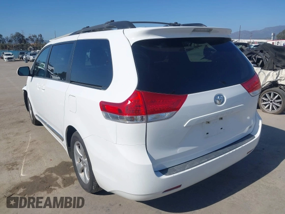2014 Toyota Sienna LE AAS with VIN 5TDKK3DC4ES515791, listed as a IAAI auction lot 42304201 with 113,139 mi miles and . Bid and sale history available at DreamBid. Image 3.